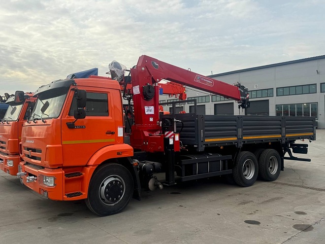 Бортовой КАМАЗ 65115 с КМУ HORYONG HRS 216